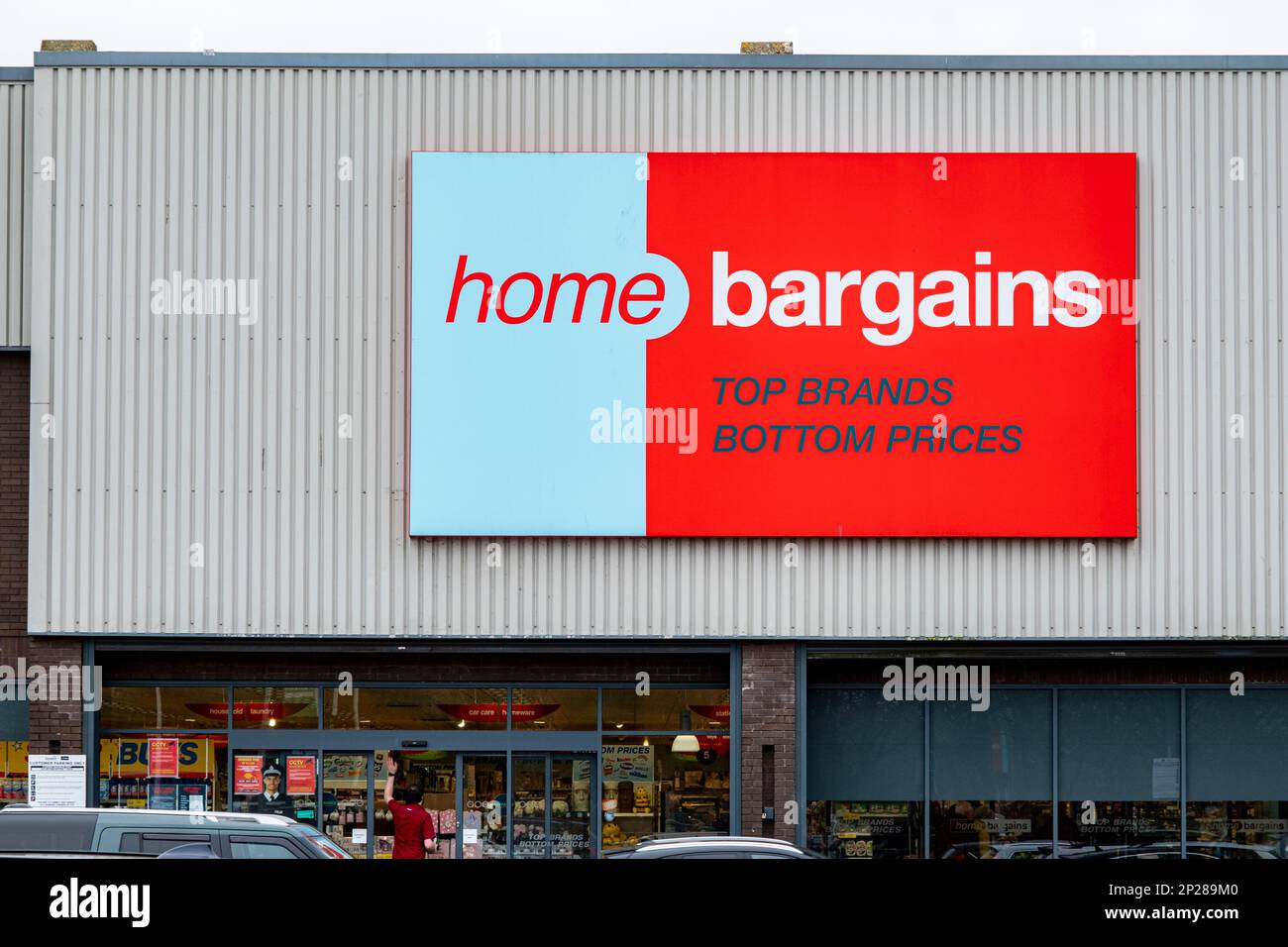 Home Bargains sign or logo on outside shop wall UK Stock Photo