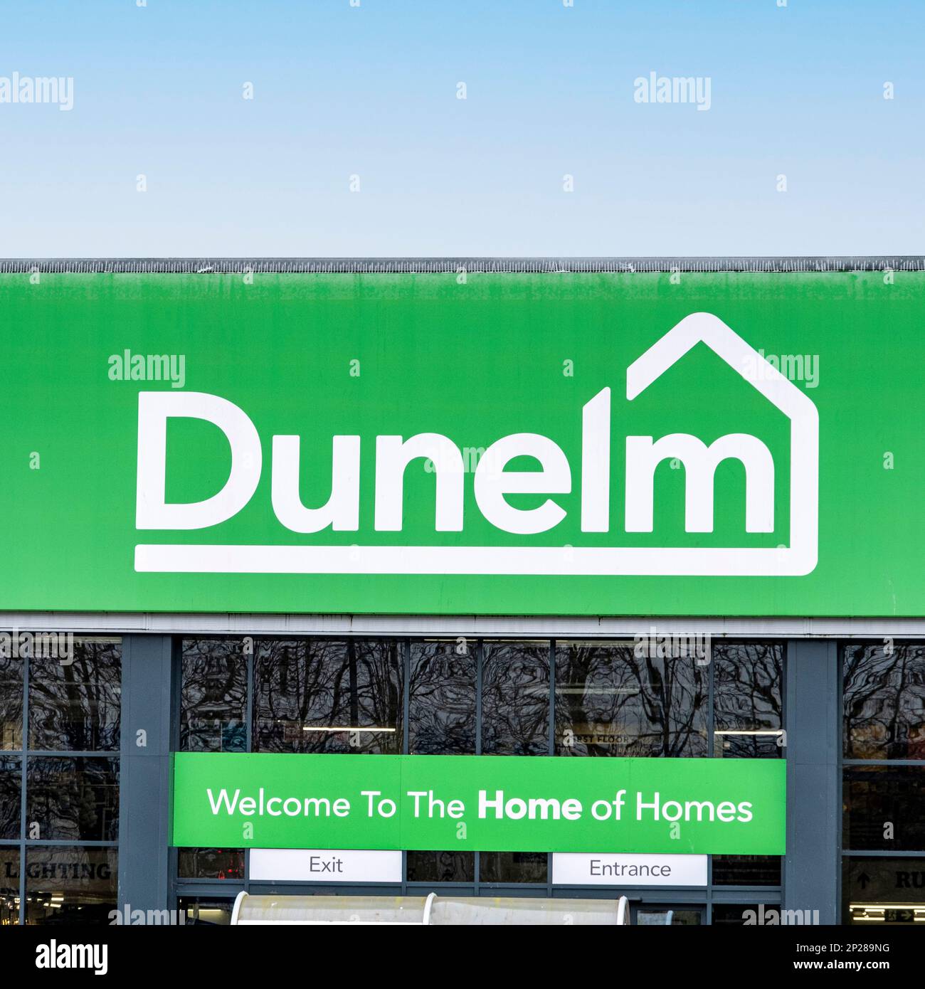 Close up of Dunelm furniture sign on outside wall UK Stock Photo