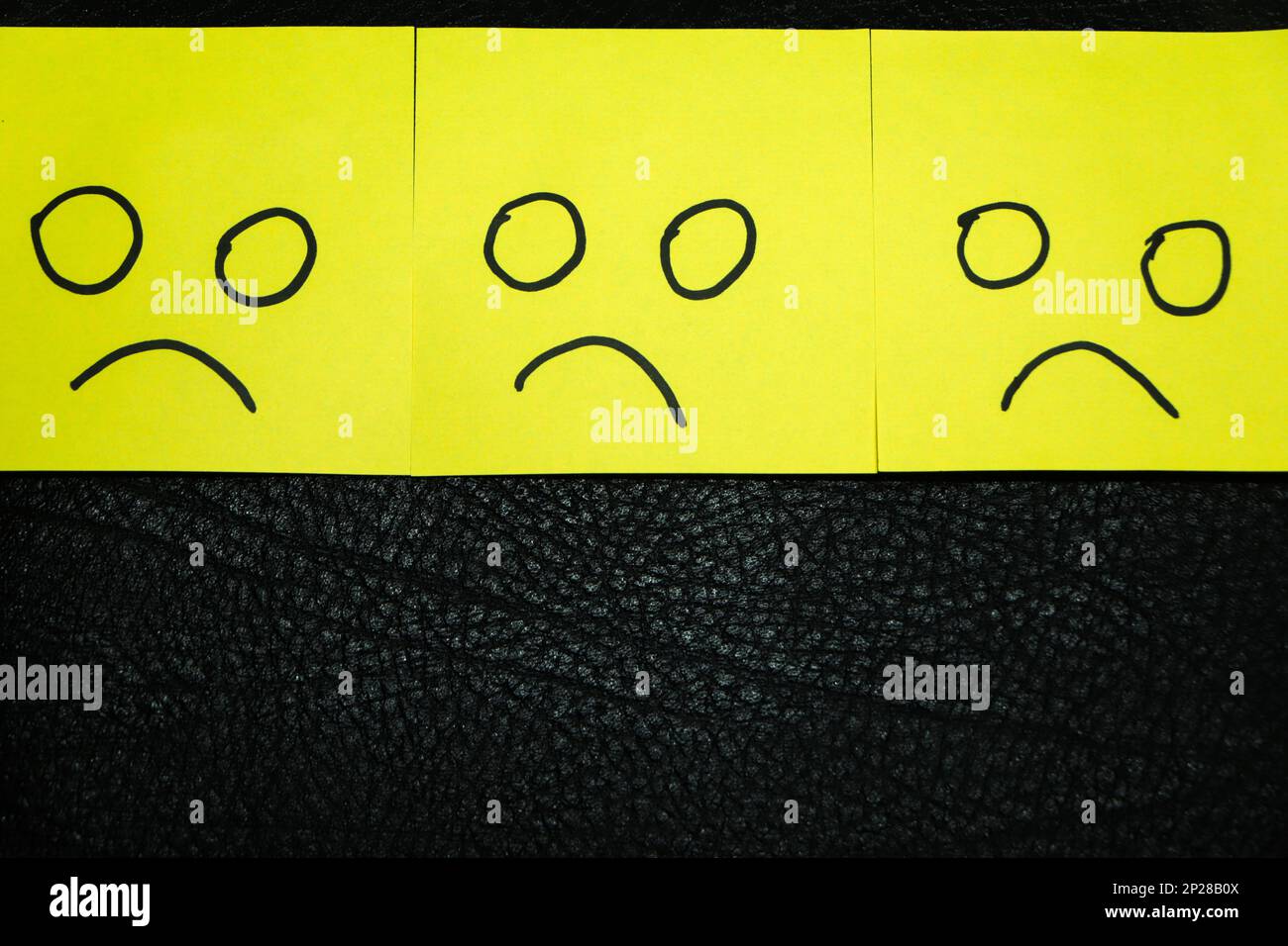 conceptual image for a be different or be happy concept using sticky notes Stock Photo