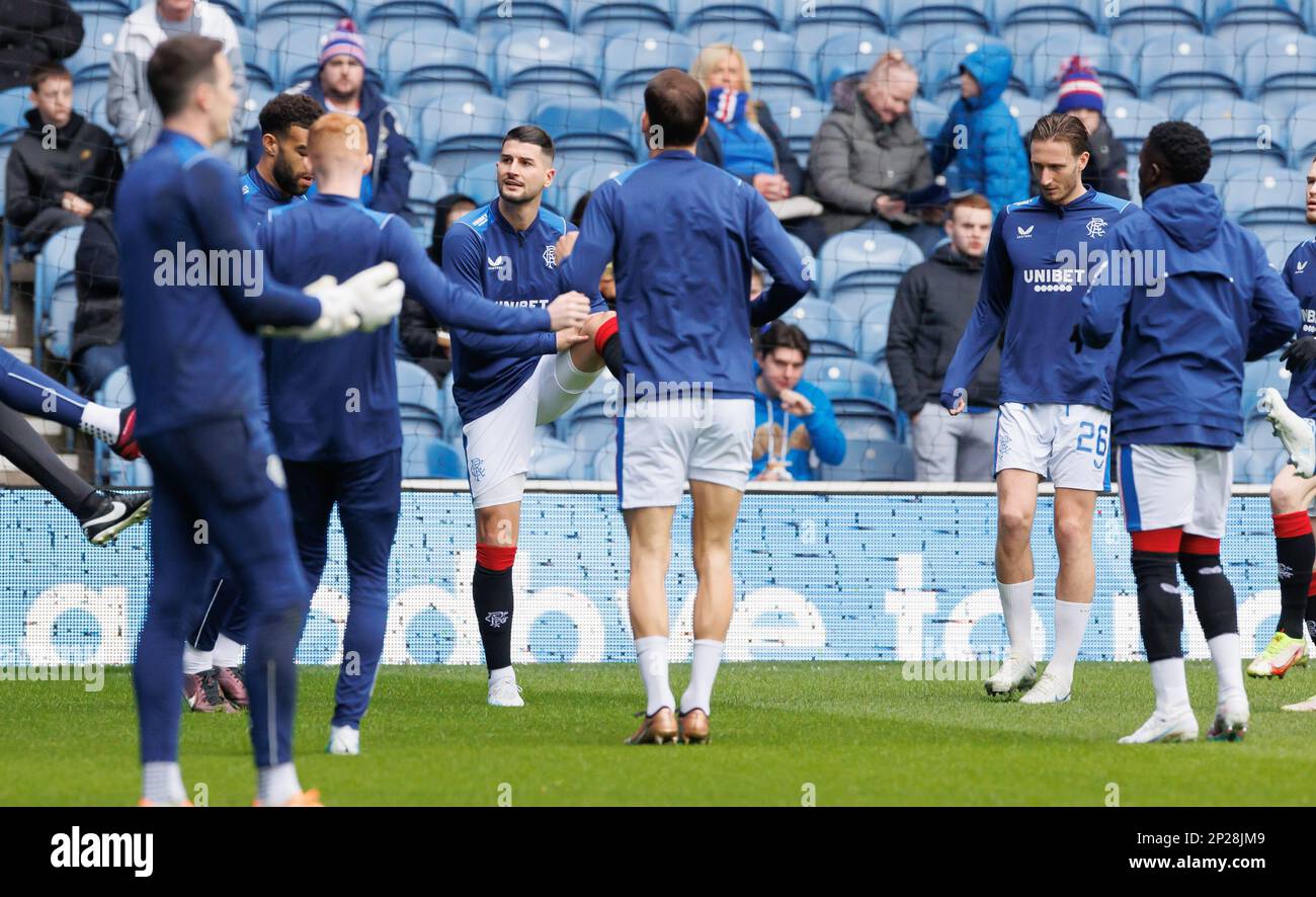 Rangers players during the pre match warm up before their match at Ibrox  Stadium, Glasgow. Picture date: Saturday March 4, 2023 Stock Photo - Alamy