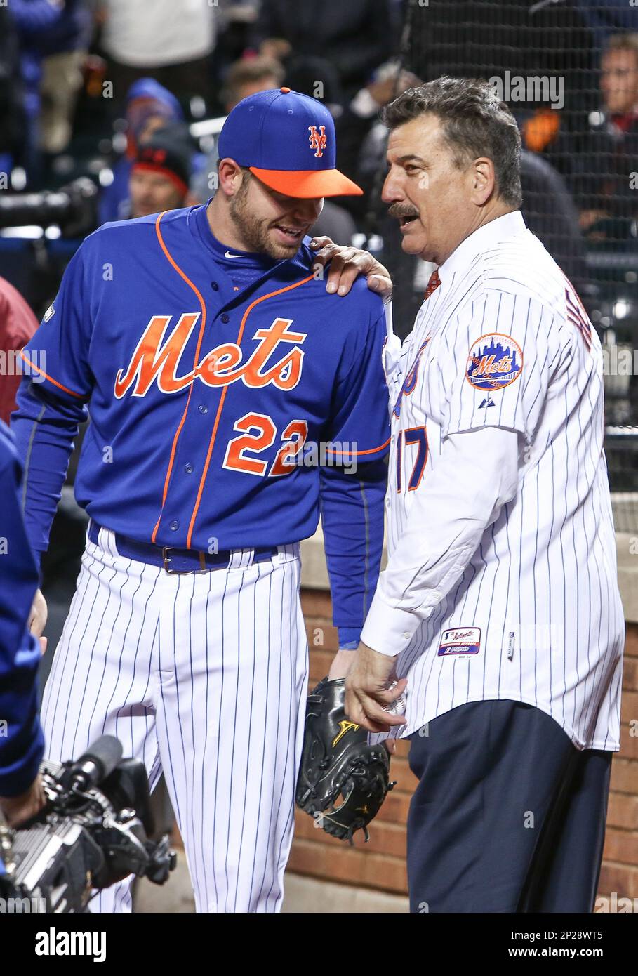 October 17, 2015: First baseman for the 1986 World Champion Mets, Keith  Hernandez (17) has a word with New York Mets catcher Kevin Plawecki (22)  [9785] prior to throwing out the ceremonial