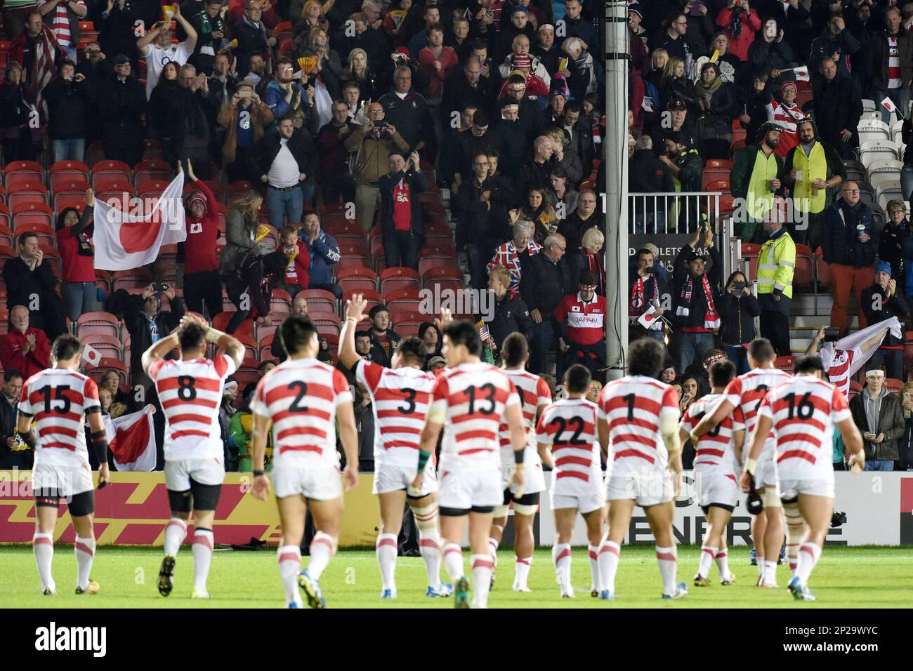 Japanese Cherry Blossoms players celebrate after beating the United States  of the Rugby World Cup Pool B match at Kingsholm Stadium in Gloucester,  England on Oct. 11, 2015. The Cherry Blossoms defeated