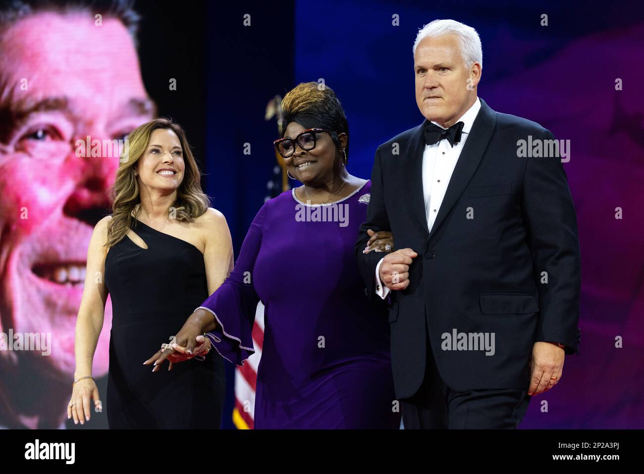Oxon Hill, United States. 03rd Mar, 2023. Matt, Chairman of the American Conservative Union, and Mercedes Schlapp escort Herneitha Rochelle Hardaway Richardson, of Diamond and Silk, to the Ronald Reagan Dinner at the 2023 Conservative Political Action Conference (CPAC) in National Harbor, Maryland, U.S., on Friday, March 3, 2023. Credit: Julia Nikhinson/CNP/Sipa USA Credit: Sipa USA/Alamy Live News Stock Photo