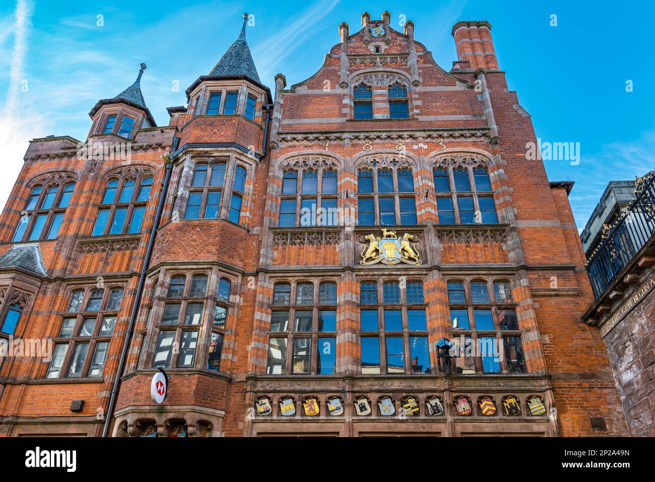 Historic ornate grand Victorian red brick building now HSBC bank, Eastgate Street, Chester, England, UK Stock Photo