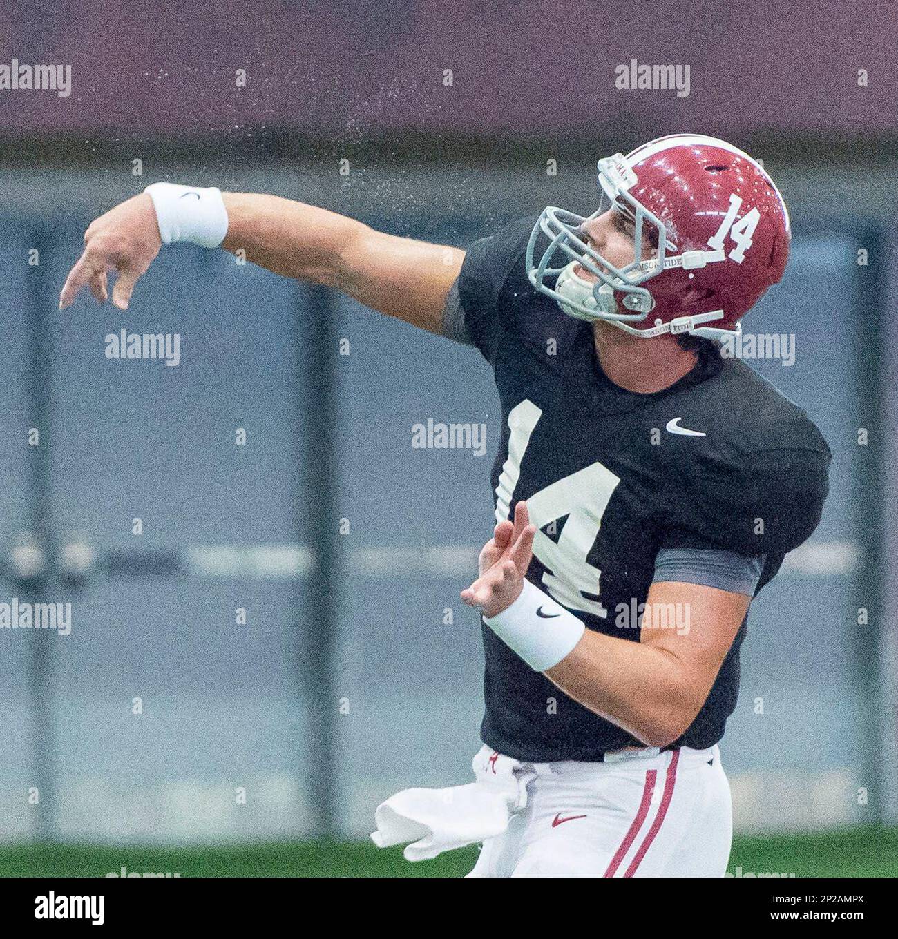 Alabama quarterback Jake Coker (14) throws during football practice