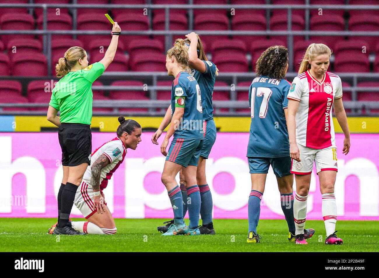 Amsterdam - Yellow card during the match between Ajax V1 v Feyenoord V1 at Johan Cruyff Arena on 4 March 2023 in Amsterdam, Netherlands. (Box to Box Pictures/Yannick Verhoeven) Stock Photo