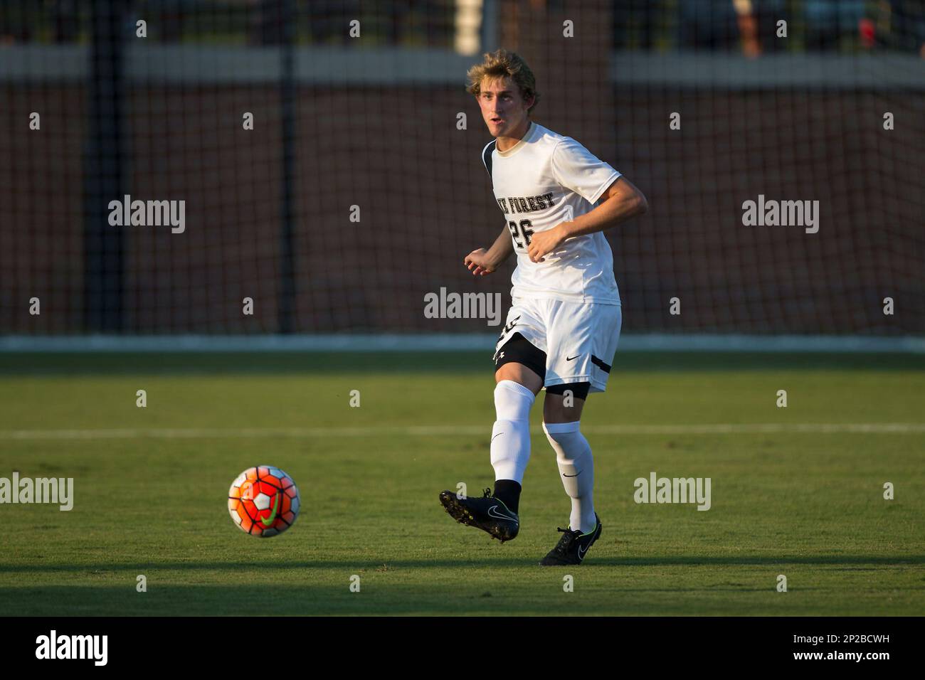 Sam Raban Sam Raben (26) of the Wake Forest Demon Deacons passes the ball during ...