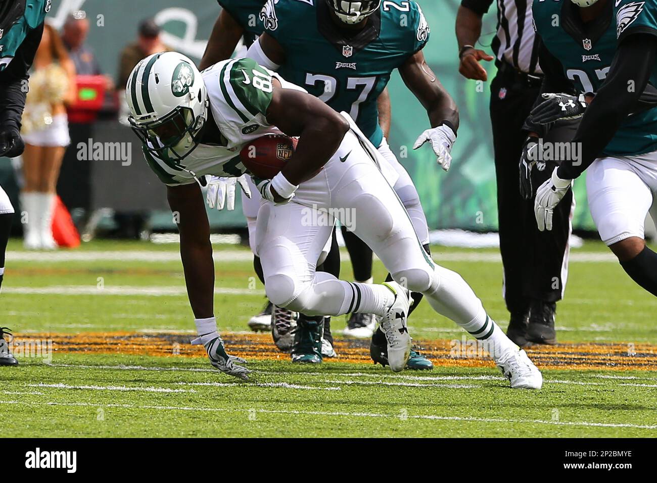 New York Jets wide receiver Wayne Chrebet puts his hands in the air while  being honored during half time of the Miami Dolphins, New York Jets game at  Giants Stadium in East