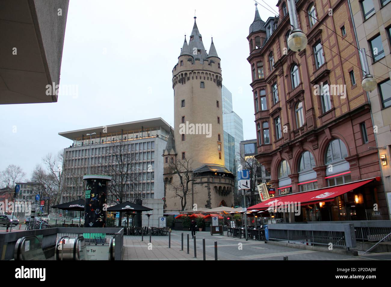 Eschenheimer Turm, late-medieval city gate tower, erected at the beginning of 15th century, view in the early evening light, Frankfurt, Germany Stock Photo