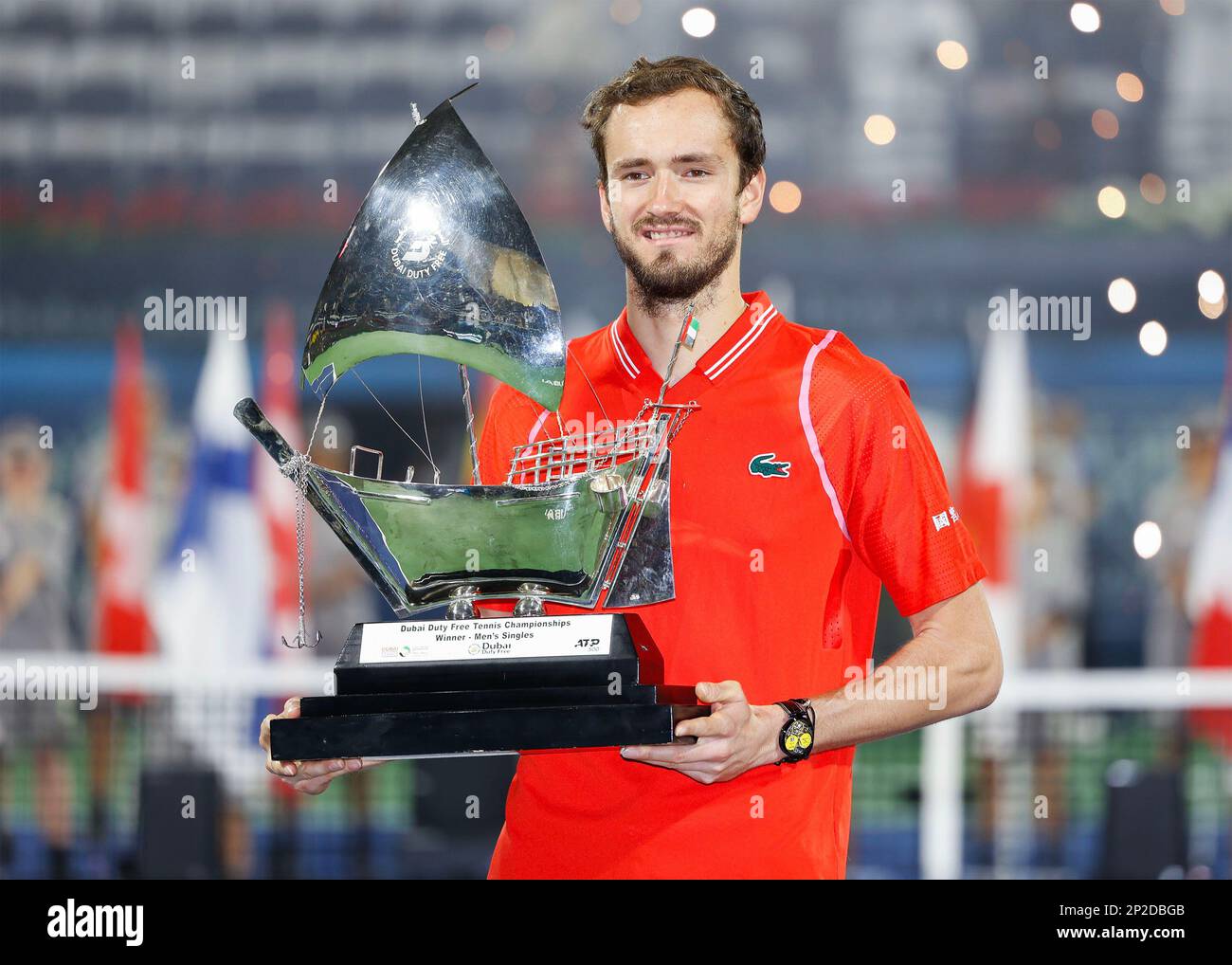 Dubai, UAE, 4th.March, 2023. Russian tennis players at the trophy  presentation, Winner Daniil Medvedev (red shirt) and runner-up Andrey  Rublev at the Dubai Duty Free Tennis Championships tournament at Dubai Duty  Free