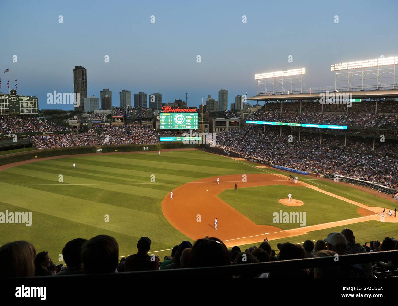 A panoramic, overhead view from third base at sunset shows Wrigley Field -  home of the Chicago Cubs - during a Major League Baseball game against the  Milwaukee Brewers August 12, 2015
