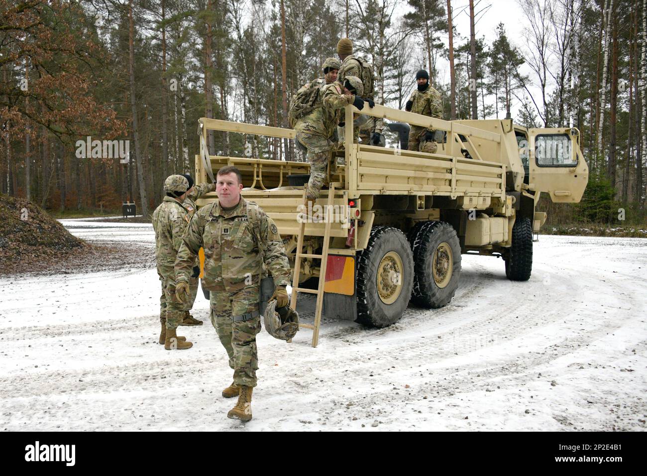 U.S. Army Cpt. Derek Raynes, foreground, with 207th Military ...