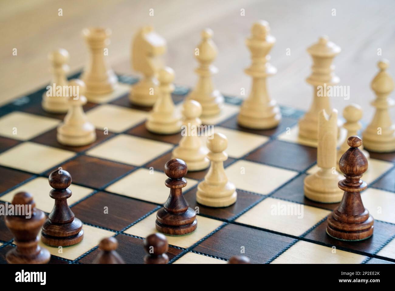 Chess pieces on a chessboard - Focus on the King Stock Photo - Alamy