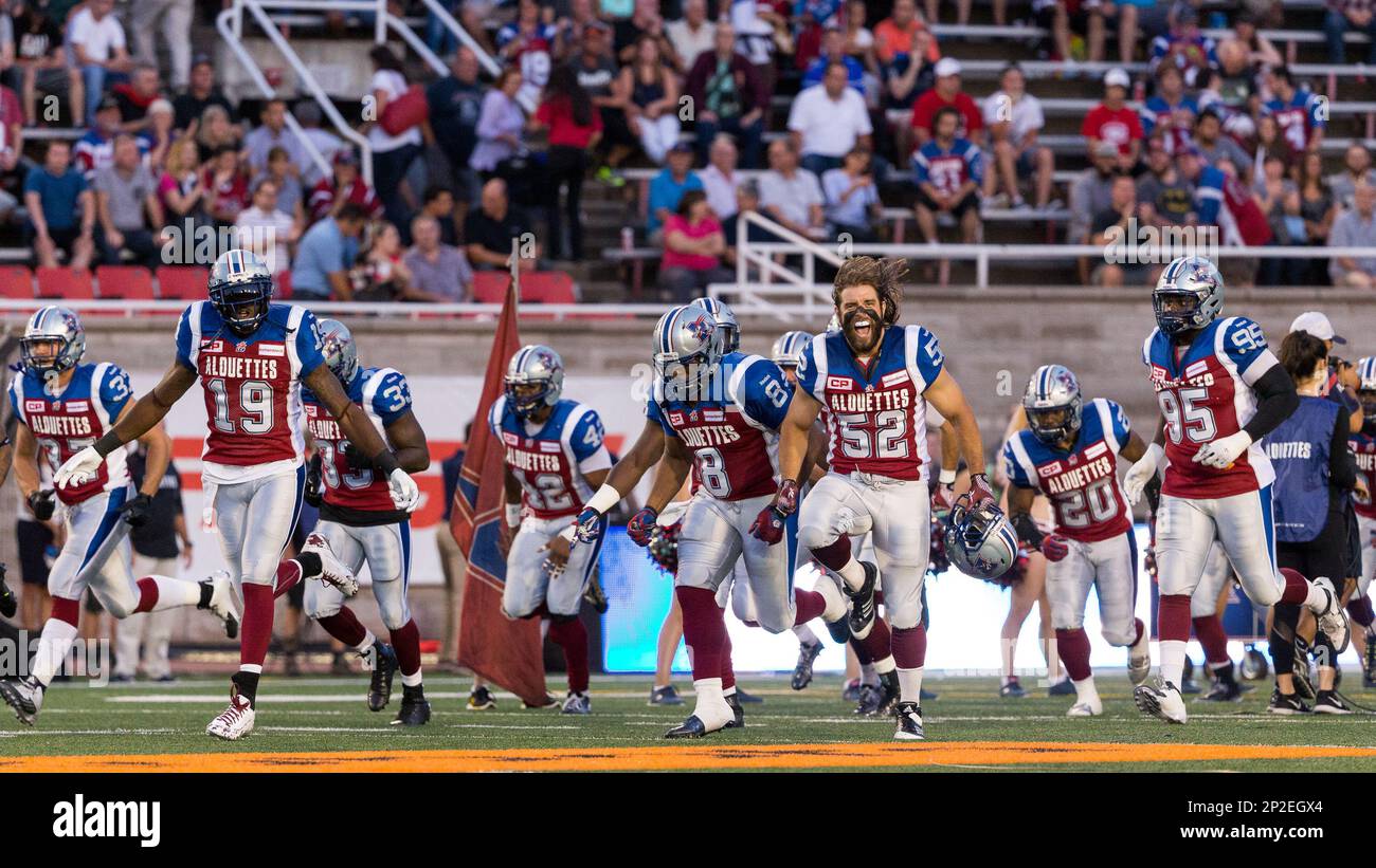 SEP 03, 2015 Montreal Alouettes' players get to the field during a