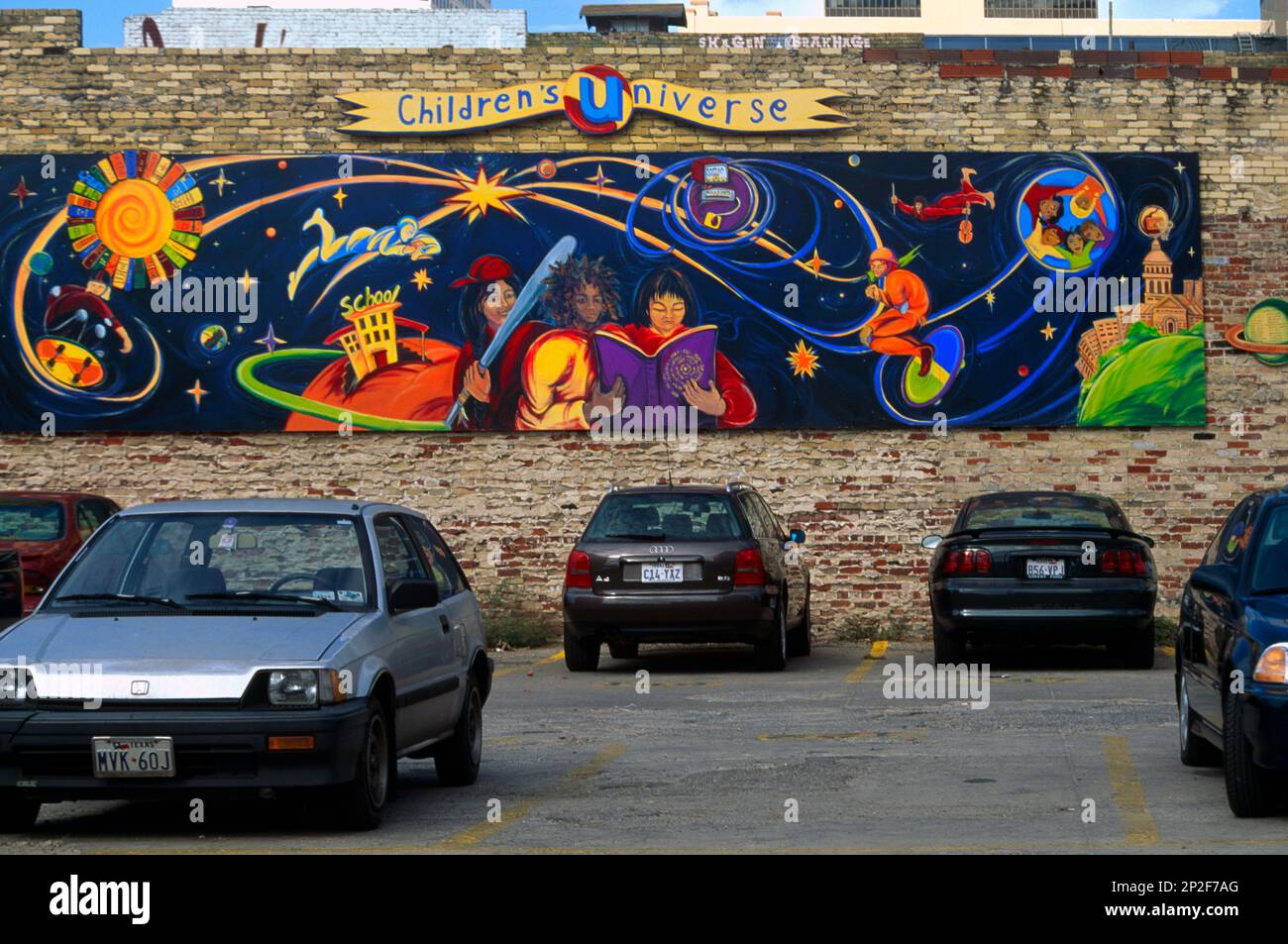 Children's Universe Mural in Parking Lot Austin Texas USA Stock Photo