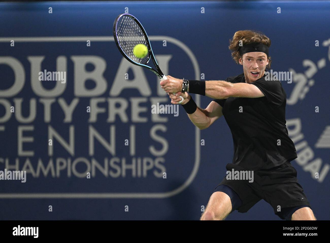 DUBAI, UAE, 4th March 2023. 2022 champion Andrey Rublev in action during  the men's singles final of the Dubai Duty Free Tennis Open Championships.  3rd seed Daniil Medvedev defeated Rublev 6-2, 6-2