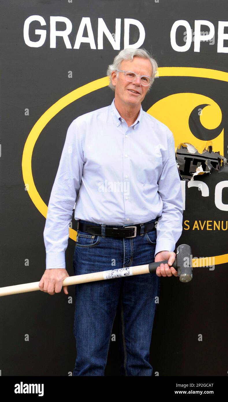 Carhartt Chairman and CEO Mark Valade takes a sledge hammer to