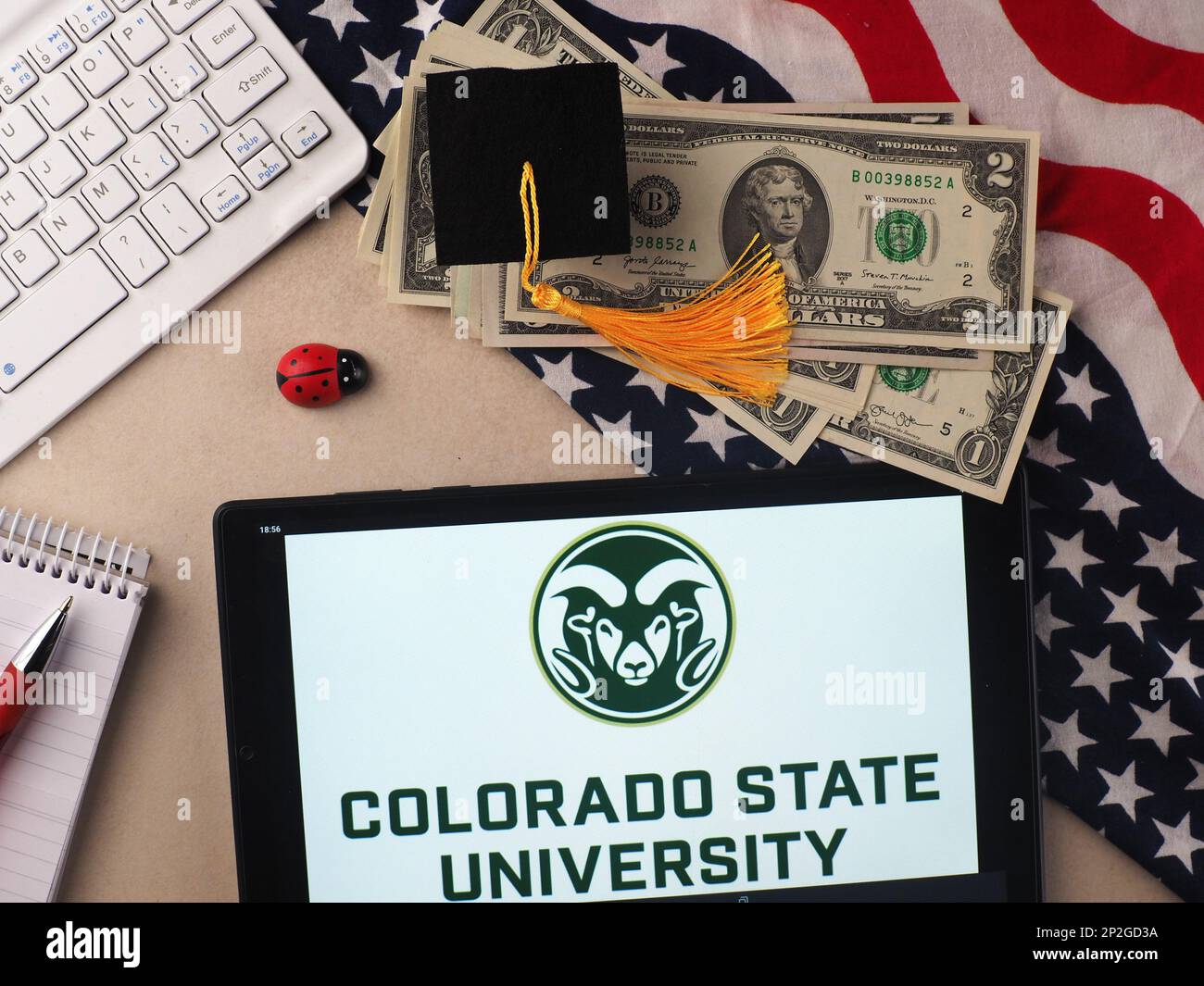 In this photo illustration, Colorado State University  logo seen displayed on a tablet. Stock Photo