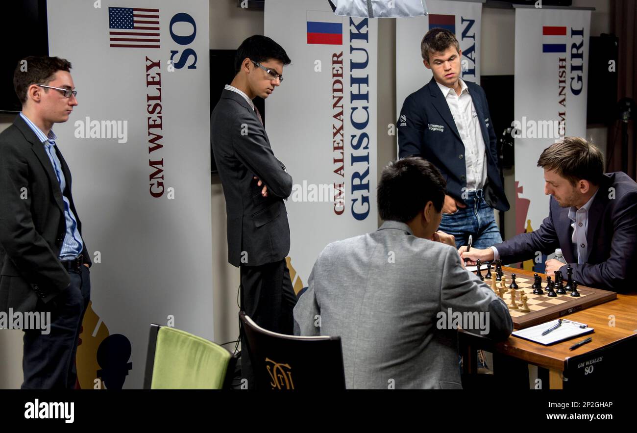 Aug.25, 2015 - St. Louis, Missouri, U.S. - From left, GM FABIANO CARUANA,  GM ANISH GIRI and GM MAGNUS CARLSEN watch the game between GM WESLEY SO and  GM ALEXANDER GRISCHUK on