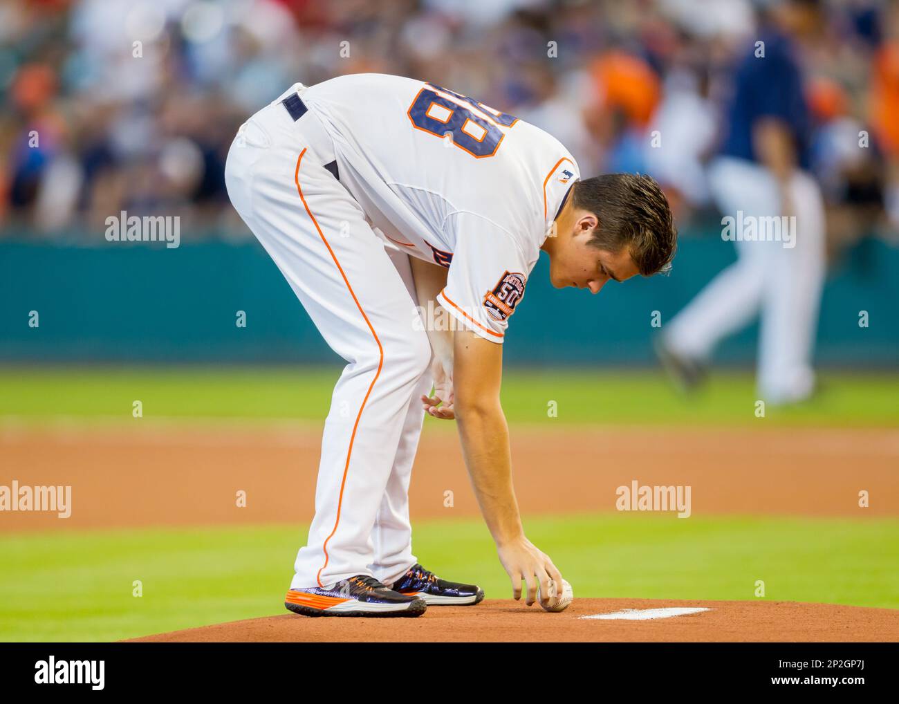 August 23, 2015 Houston Astros bat boy inspects the pitcher's mound