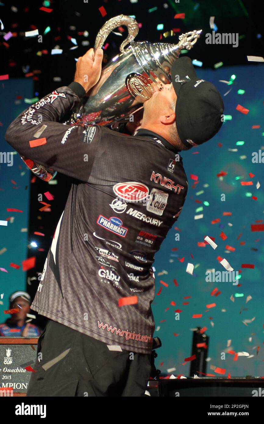 Aug. 23, 2015 - Hot Springs, AR, U.S. - August 23, 2015: Brad Knight kisses  the trophy after winning the Forrest Wood Cup on Lake Ouachita in Hot  Springs, AR. Justin ManningESWCSM (