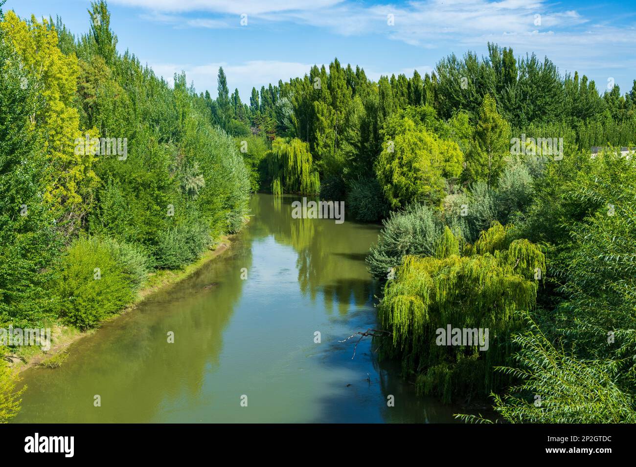 Chubut river flowing towards the sea in Trelew in Argentina Stock Photo