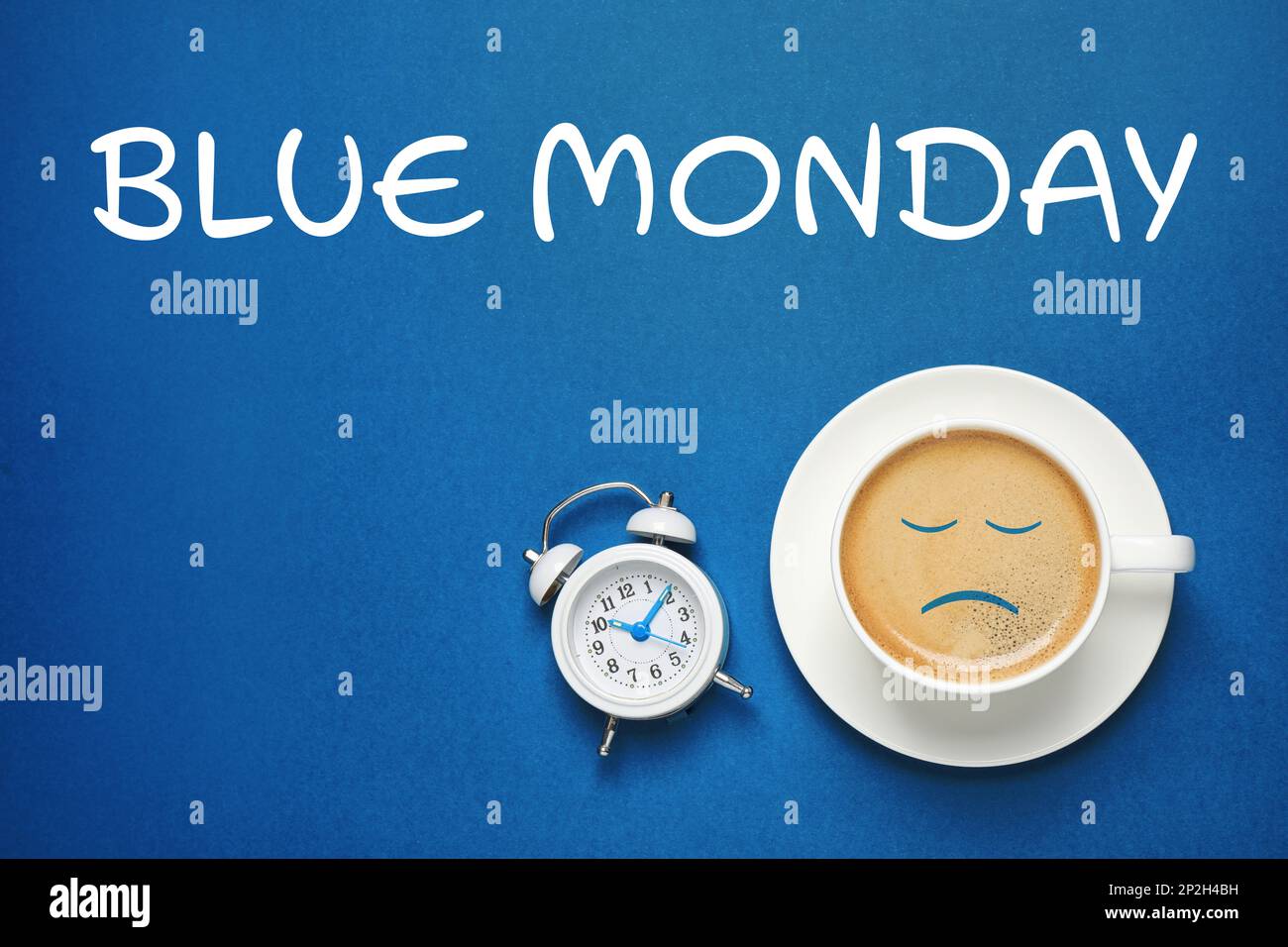 https://c8.alamy.com/comp/2P2H4BH/cup-of-coffee-alarm-clock-and-text-blue-monday-on-color-background-flat-lay-2P2H4BH.jpg