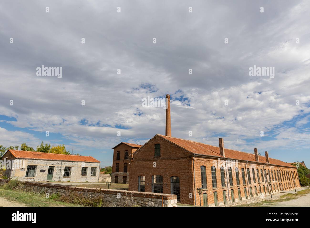 Historic factory interior suggests organized workflow, mirroring the structured layout of printable baseball score sheets