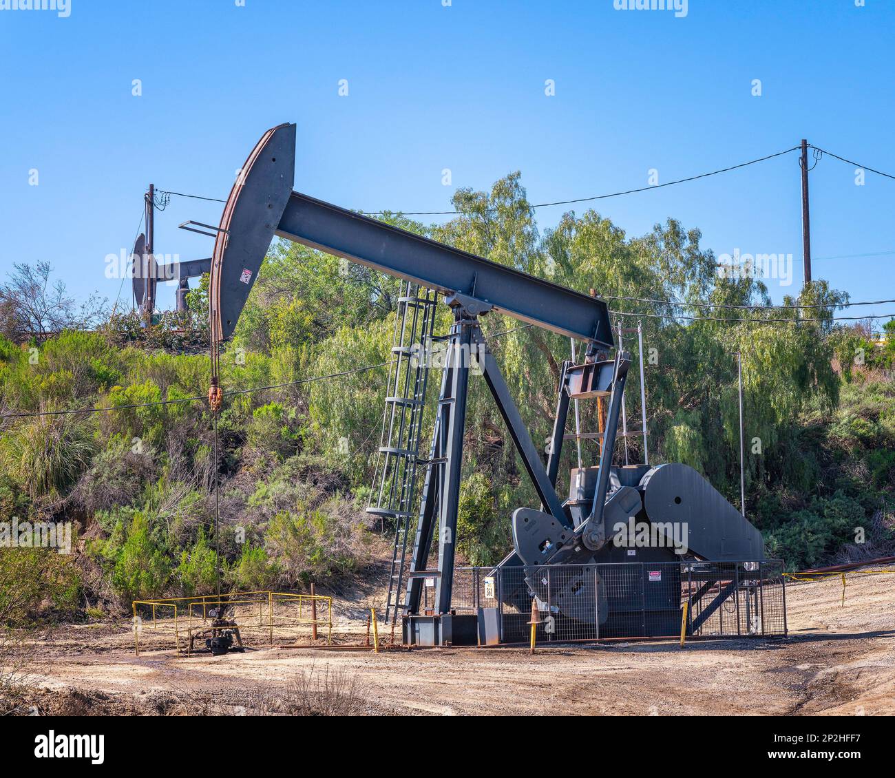March 3, 2023, Los Angeles, CA, USA: Pumpjacks operate at the Inglewood Oil Field in Los Angeles, CA. It is the largest oil field in LA. Stock Photo