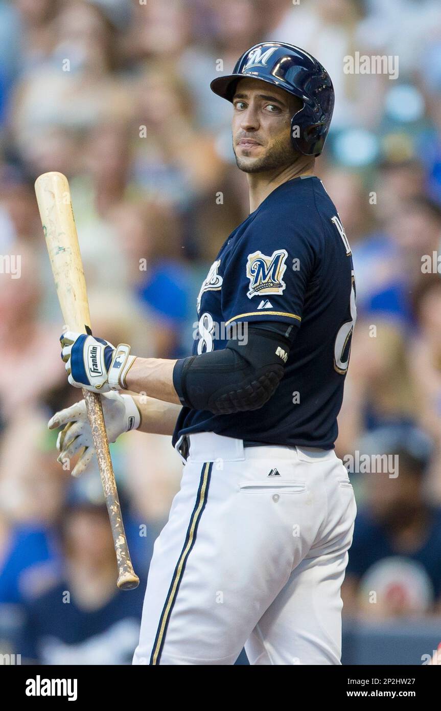 MILWAUKEE, WI - AUGUST 06: Milwaukee Brewer catcher Jonathan Lucroy signs  his retirement papers prior to a game between the Milwaukee Brewers and the  Cincinnati Reds at American Family Field on August