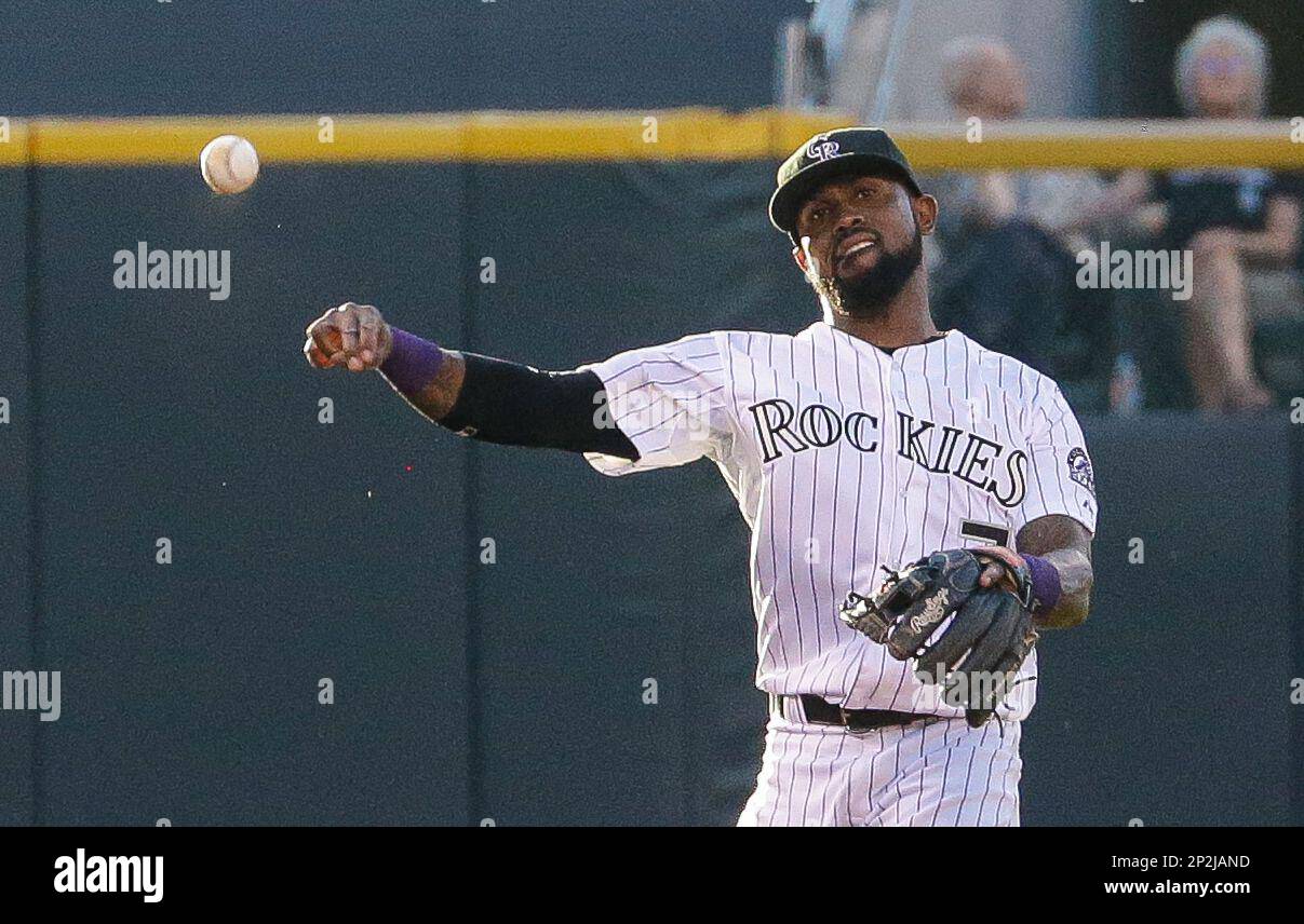 Colorado Rockies shortstop Jose Reyes (7) makes the throw to first base in  a game against the Seattle Mariners. The Rockies defeated the Mariners 7-5  on August 5, 2015, at Coors Field