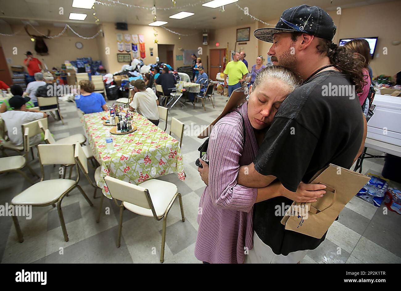John and Cassandra Raffaelli, of Spring Valley, Calif., wait word on a