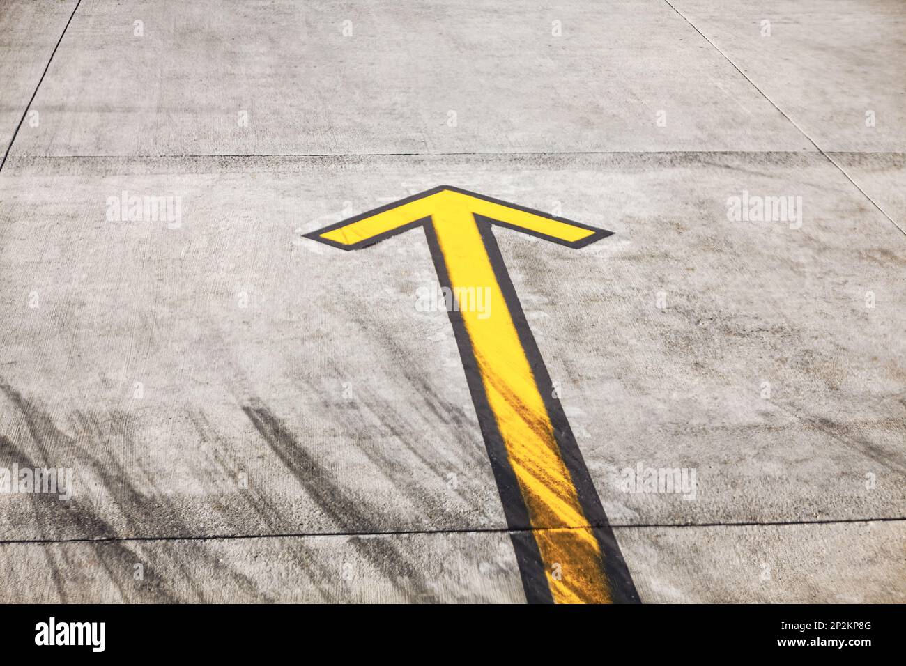 Arrow on the runway . Direction indicator for aircraft on the runway