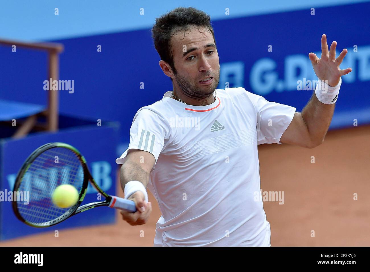 Marsel Ilhan of Turkey returns a ball to Santiago Giraldo of Columbia  during their match at the Suisse Open tennis tournament in Gstaad,  Switzerland, Wednesday, July 29, 2015. (Peter Schneider/Keystone via AP