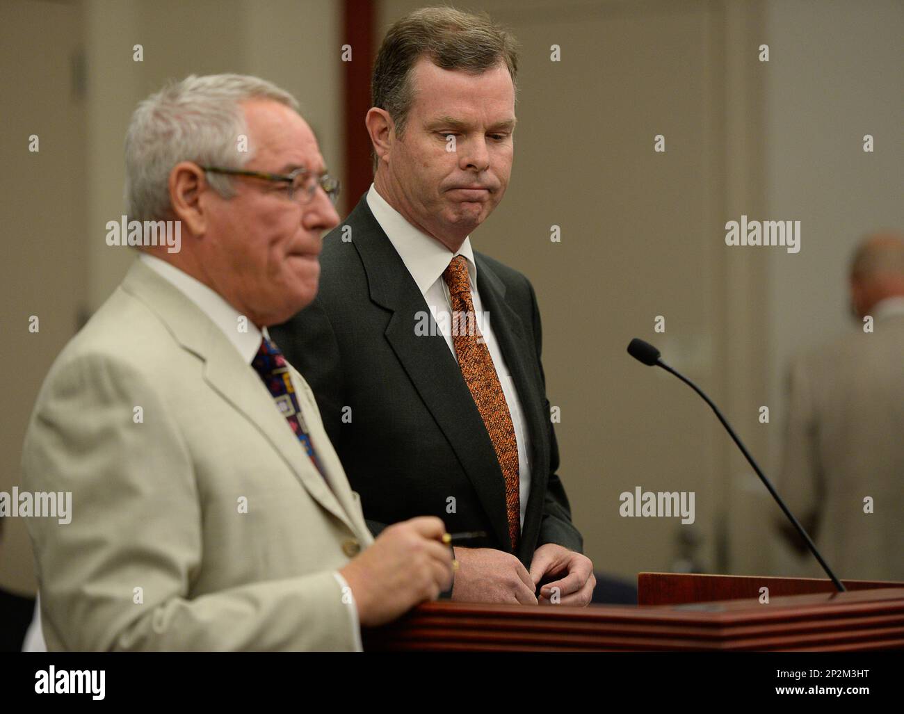 Former Utah Attorney General John Swallow, right, appears at the