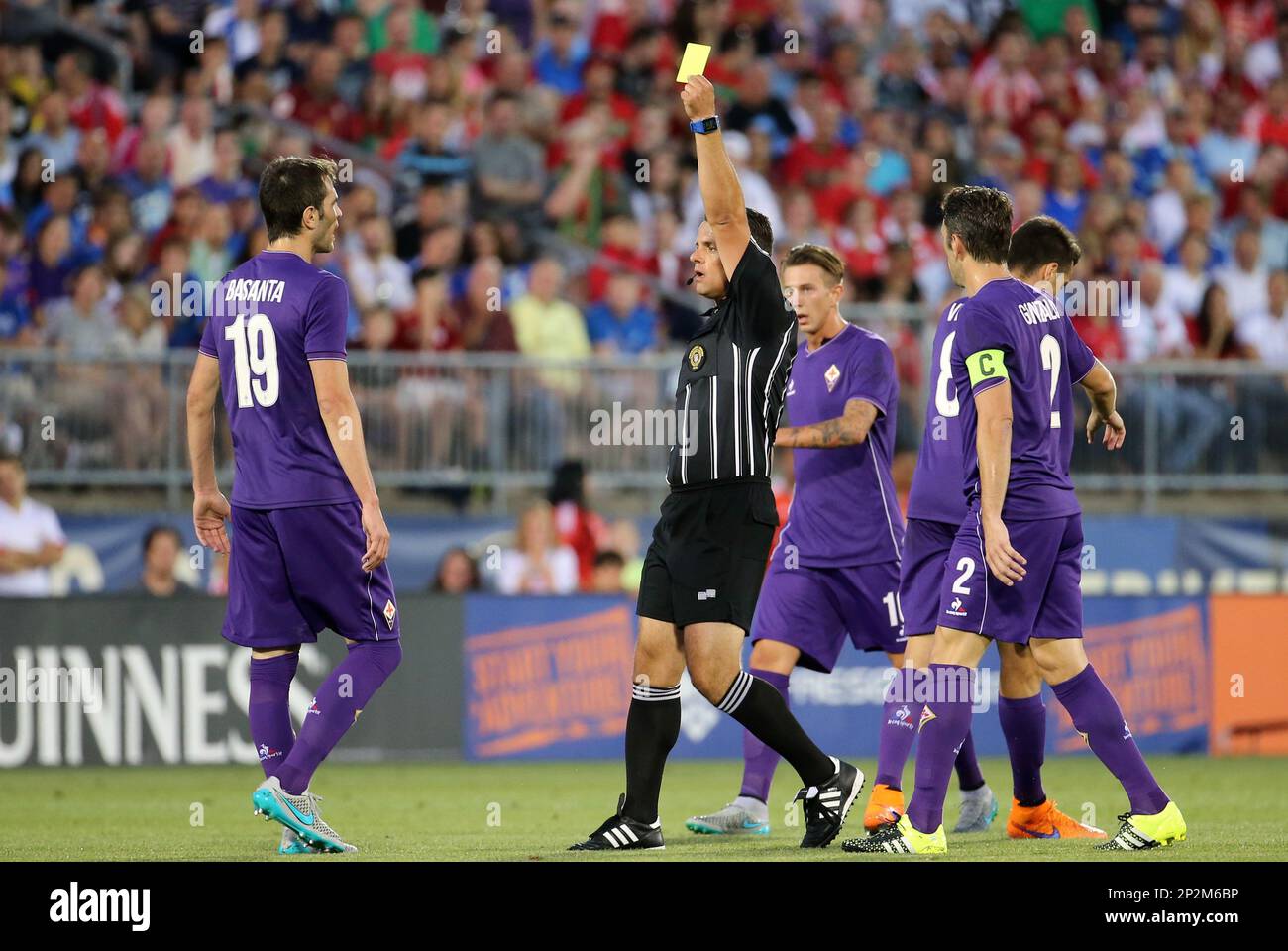 July 24, 2015: Referee Sorin Stoica (USA) issues a yellow card to ACF  Fiorentina defender Jose Maria Basanta (19). ACF Fiorentina (Serie A)  defeated SL Benfica (Primeira Liga) 1-0 (5-4 PKs) in