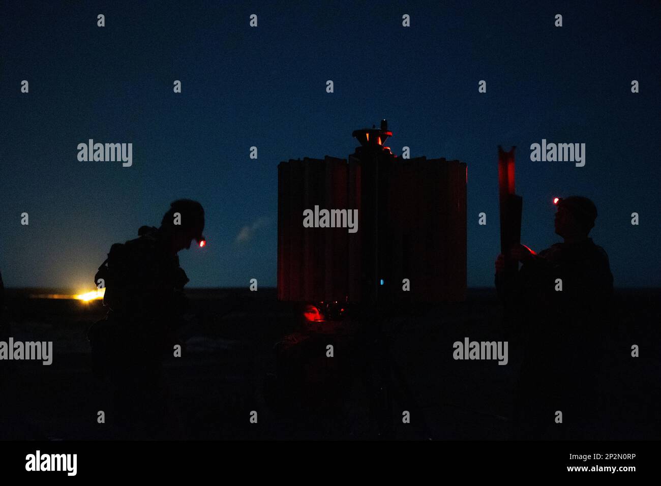 U.S. Marines with Sierra Battery, Battalion Landing Team 1/6, 26th Marine Expeditionary Unit, launch and track flares during Lightweight Counter Mortar Radar (LCMR) system familiarization training on Marine Corps Base Camp Lejeune, North Carolina, Feb. 3, 2023. The LCMR is a light-weight advanced mountable radar system that is capable of multi-mission tasks such as detecting early warning fires, counterfire target acquisitioning and air surveillance while deployed. Stock Photo