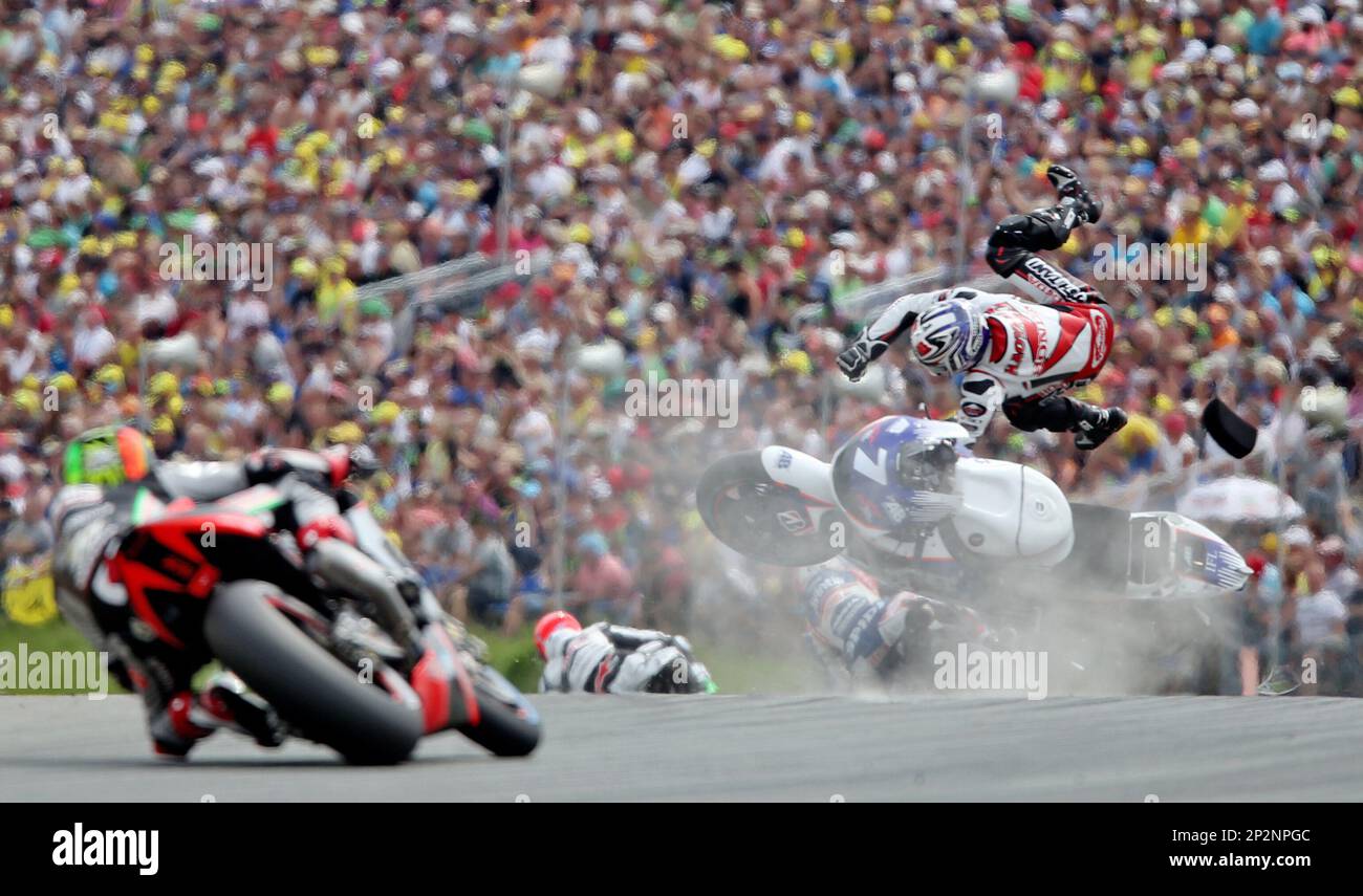 Japanese MotoGP rider Hiroshi Aoyama , right, of AB Motoracing ...