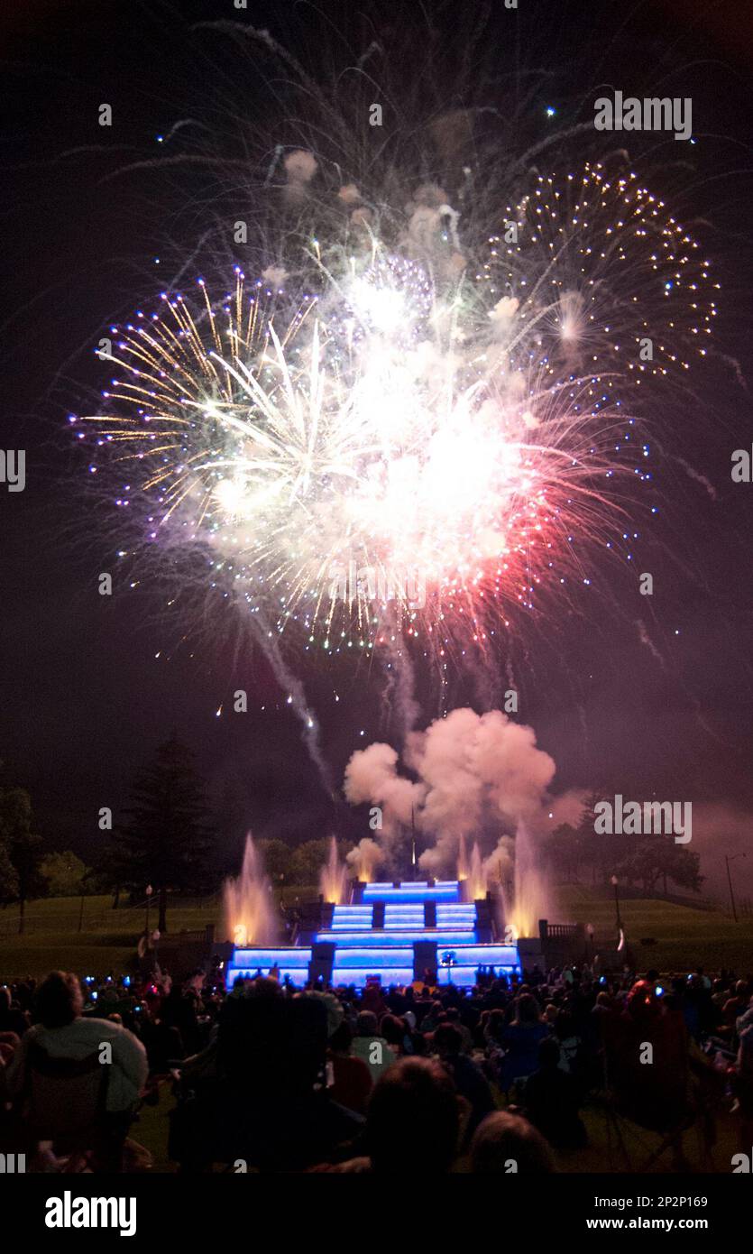 Fireworks burst above Cascade Falls during a Fourth of July fireworks
