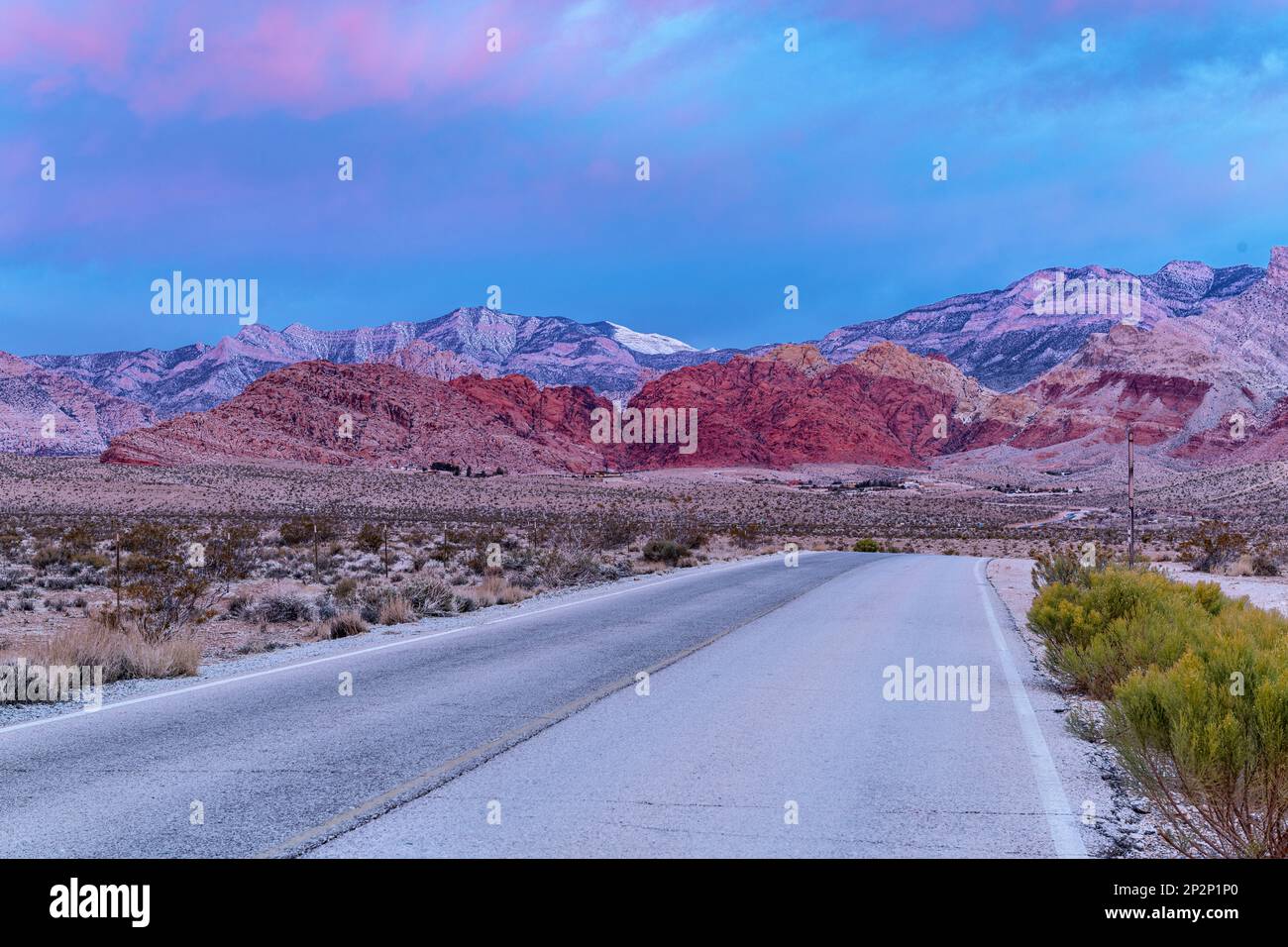 Beautiful early morning light bounces off the mountains of Red Rock Canyon in Las vegas, hence the name sake. Stock Photo