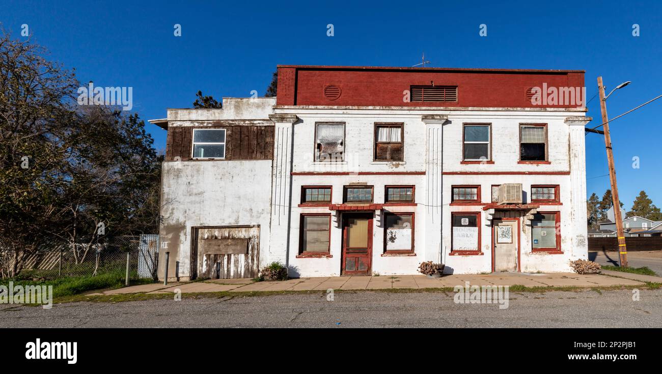 Artois CA USA - Feb 12 2023: Old Apartment Buidling Complex that housed the Post Office on HWY 99W Stock Photo