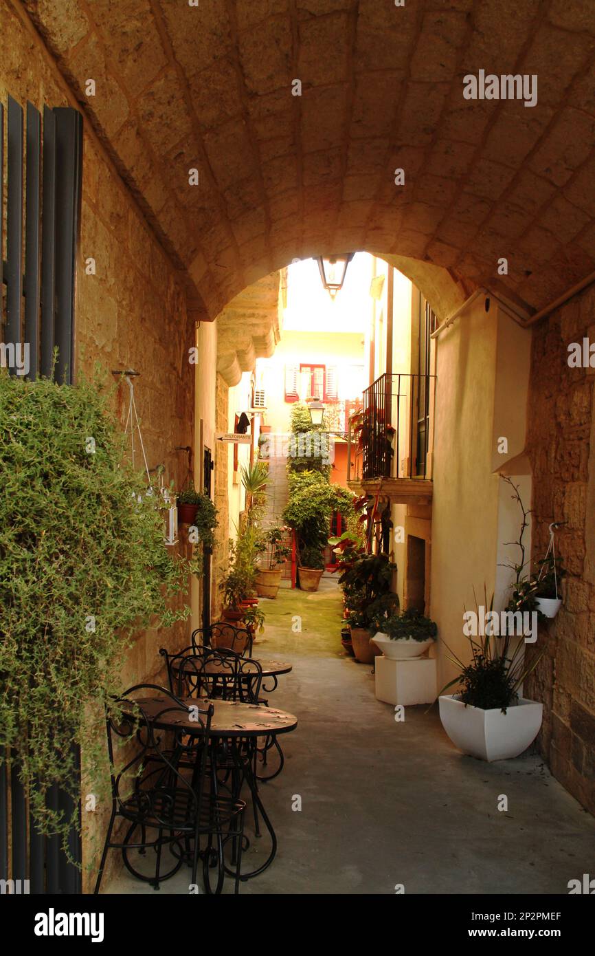 Sidewalk seating area of a cafe in the historical center of Galatina, Italy Stock Photo
