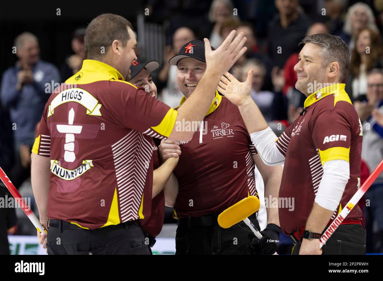 Team Nunavut celebrate their win over Team Newfoundland and Labrador during the Tim Hortons Brier curling event, Saturday, March 4, 2023, in London, Ontario