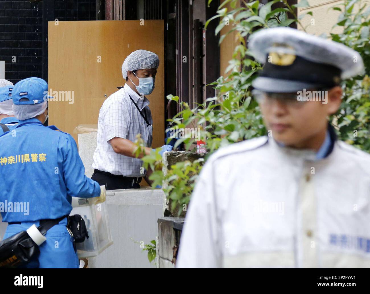 Japanese police search the apartment of the man who set himself on fire ...