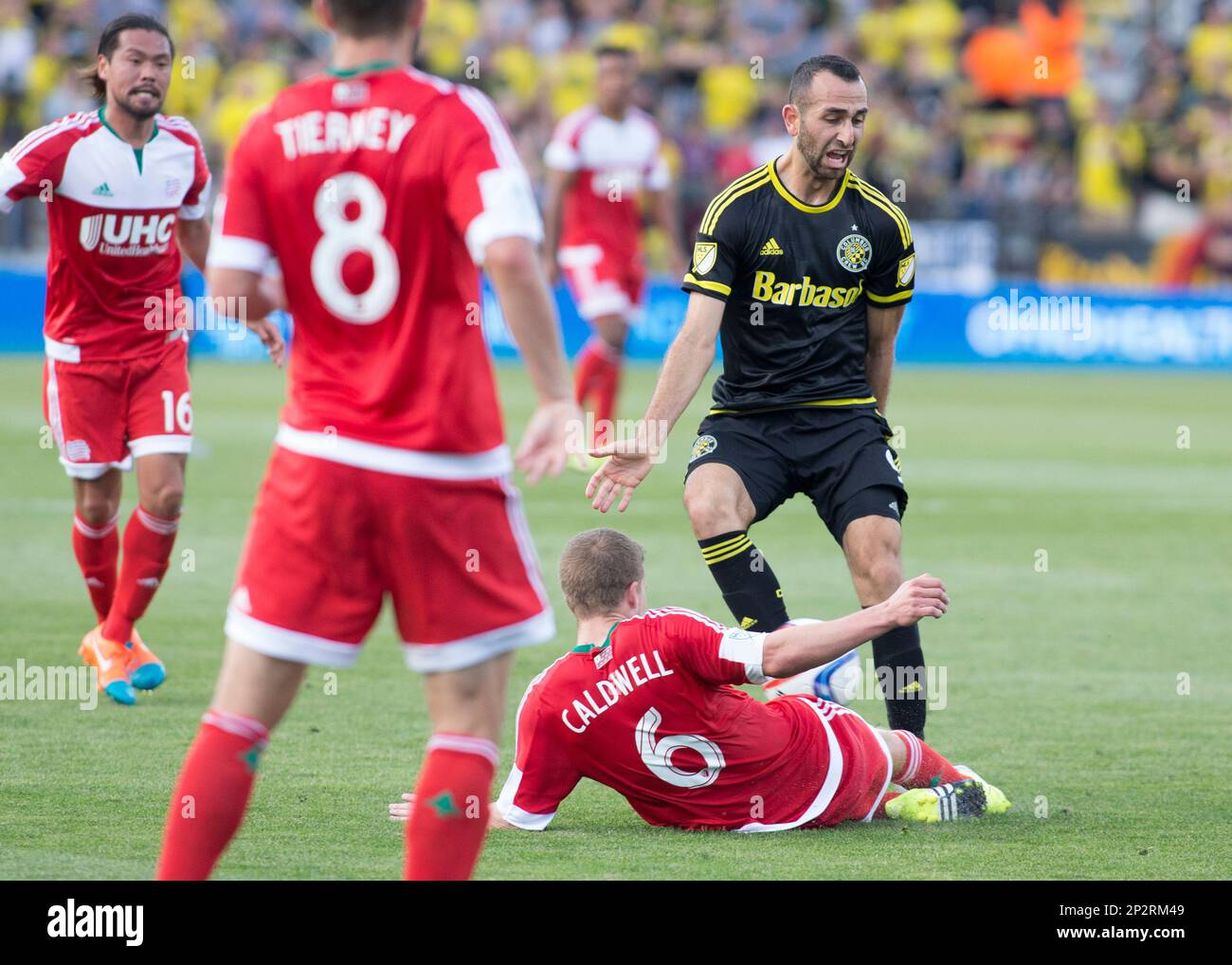 24-june-2015-justin-meram-9-of-the-columbus-crew-sc-being-tackled-by