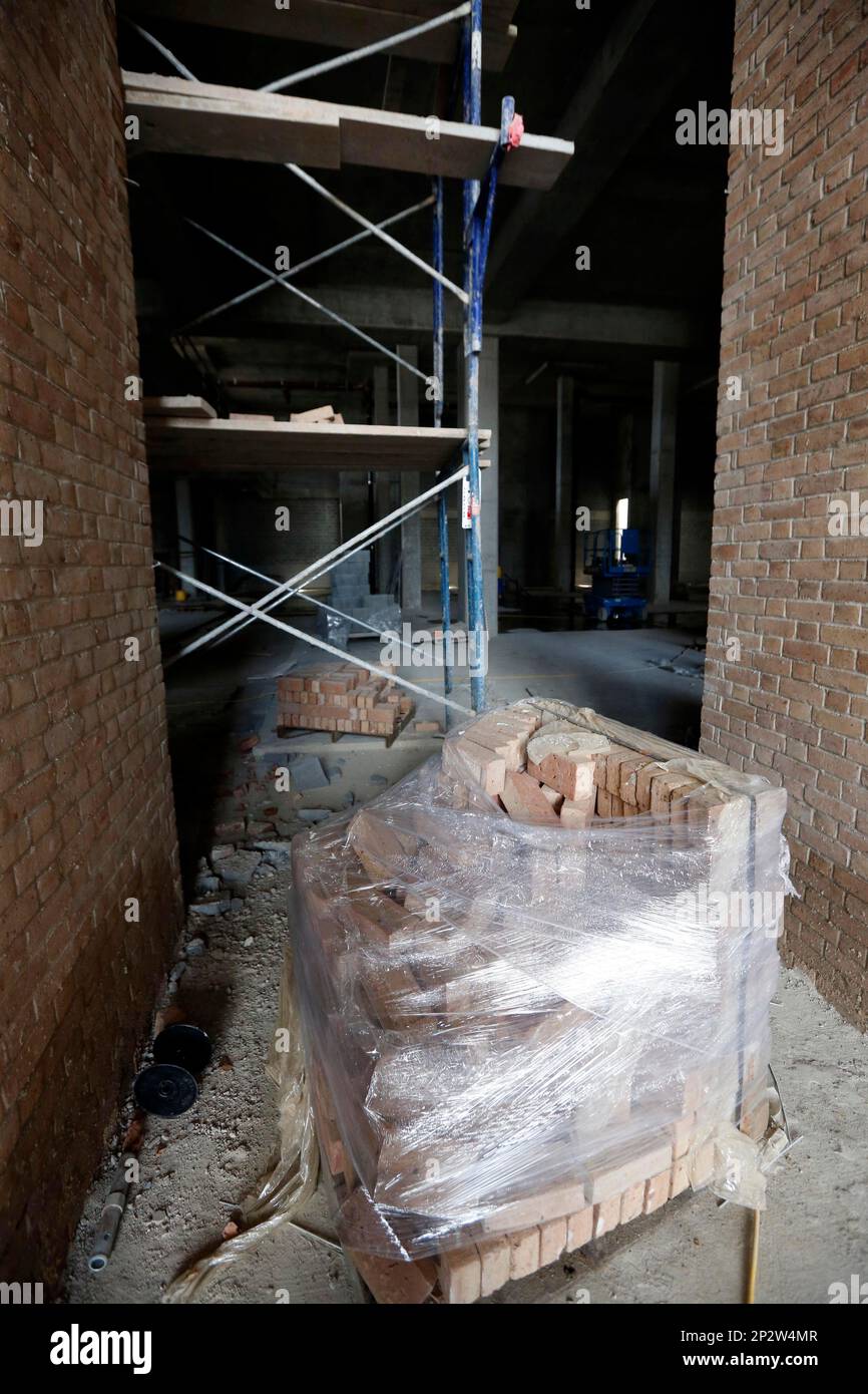Bricks and scaffolding align the pillars of the history hall for the conjoined entrance for The