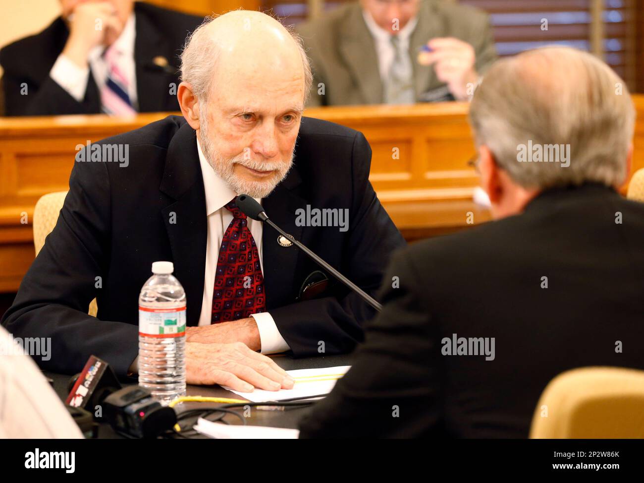 Sen. Les Donovan sits across the table from Kansas House Taxation