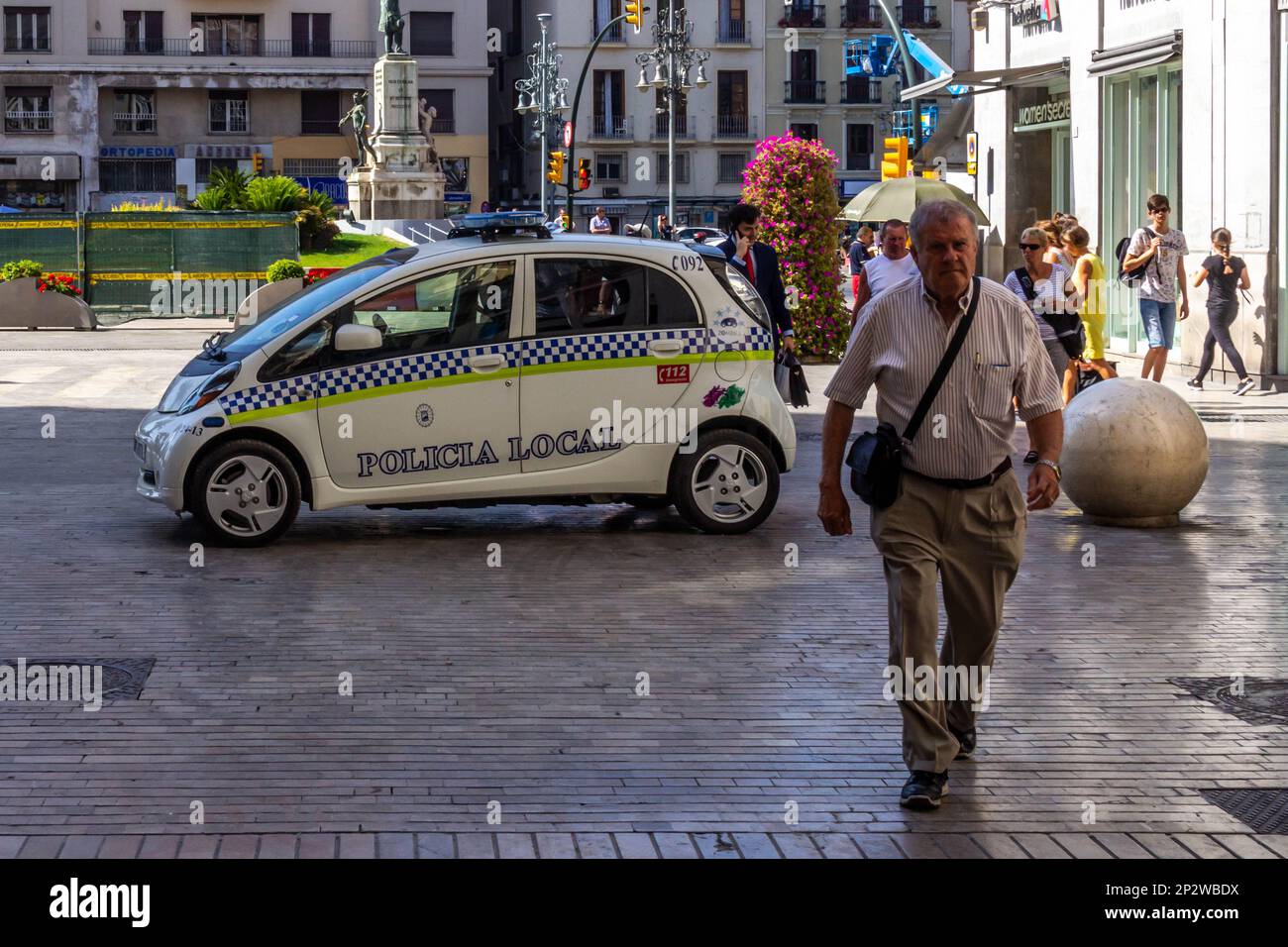 Malaga, Spain - June 18th 2018:Police car blocking pedestrian access to prevent terroist attacks, The city is the capital of a province with the same Stock Photo