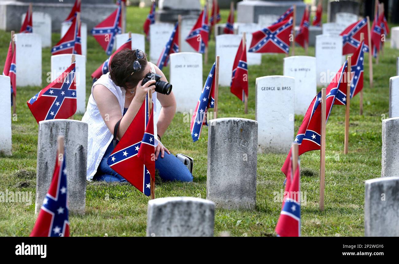 Sandy Burner of Fort Valley, Va. photographs the graves of Confederate