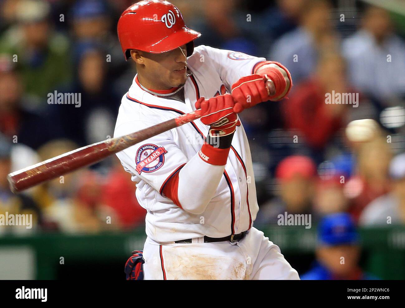 Washington Nationals' Ian Desmond gets his grip on his bat during the  seventh inning of an interleague baseball game against the Chicago White  Sox at Nationals Park ,Wednesday, April 10, 2013, in